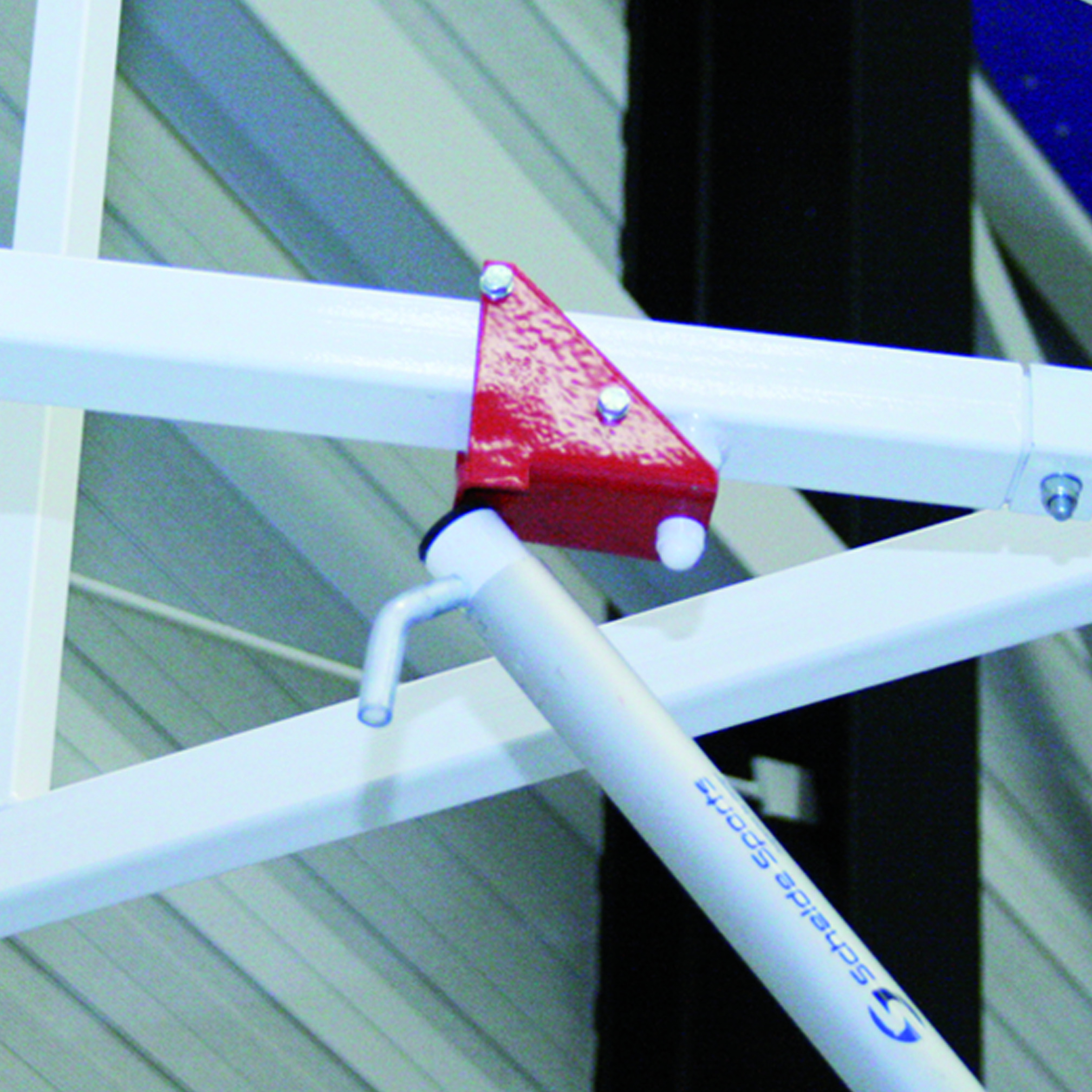 Operating stick for wall-mounted basketball backstops